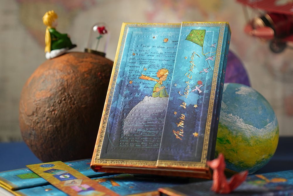Agenda 2026 - 2027 PAPERBLANKS Saint - Exupéry, Le Petit Prince - 1 semaine sur 2 pages - Midi - Hardcover - Horizontal - 176p - 9780349720265